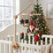 Mobile de lit bébé en bois, modèle Père Noël et sapins, fixé sur un lit à barreaux