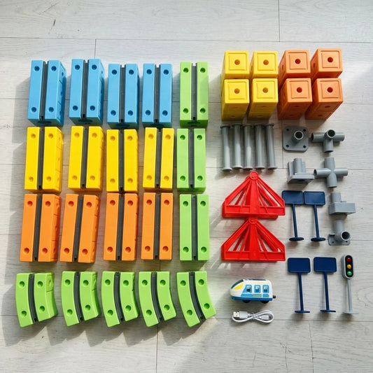 circuit-train-magnetique-contenu-02 Circuit de Train Spatial 3D Montessori
