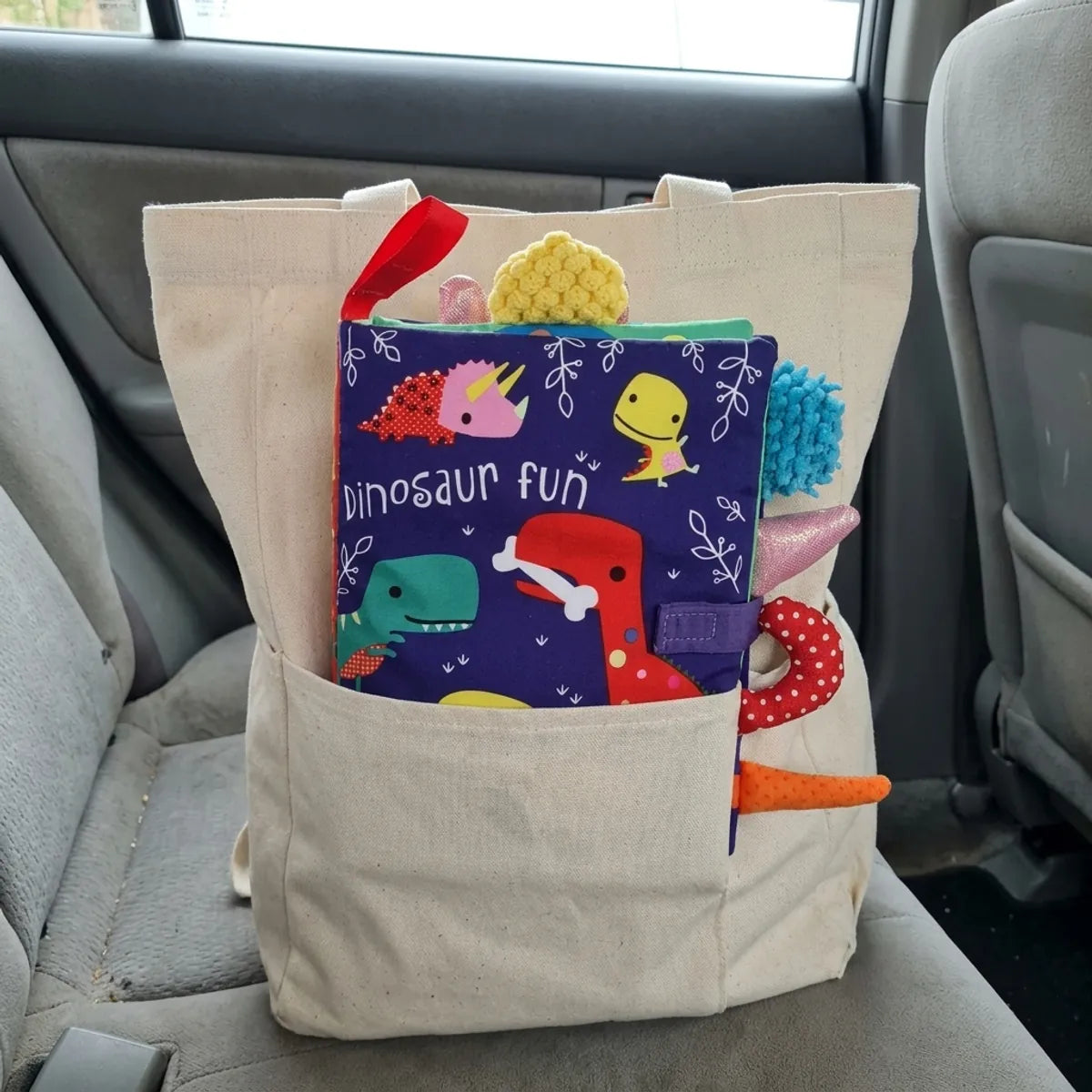 livre-eveil-tissu-bebe-sac-a-langer-10 Livre sensoriel souple Montessori