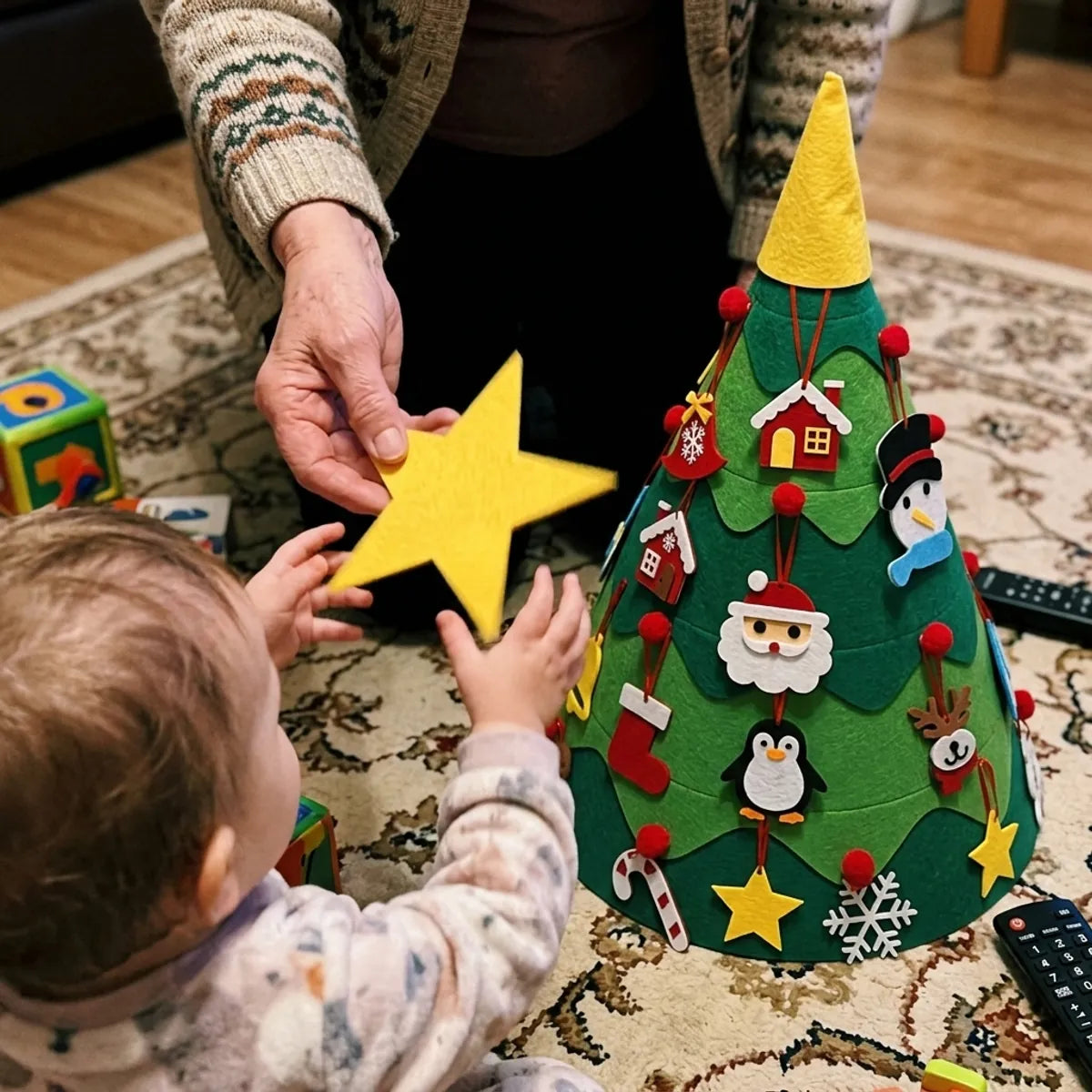 Étoile en feutrine tendue par une grand-mère à un tout-petit